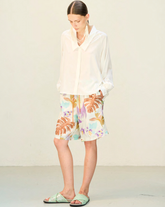 Camicia boxy fit con collo lungo e scollo aperto in seta elasticizzata bianca - Bianco | Giemme BrandsCorporate