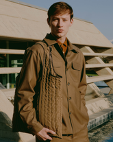 Giacca camicia over fit con collo revers in lana vergine elasticizzata in un'esclusiva tonalità di marrone - Collezione UOMO | Giemme BrandsCorporate
