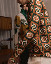 Regular fit shirt in pure silk with an exclusive green geometric print - Woman collection | Giemme BrandsCorporate