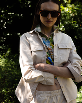 Camicia over fit con collo button down in cotone elasticizzato tinto capo beige - Caliban | Giemme BrandsCorporate